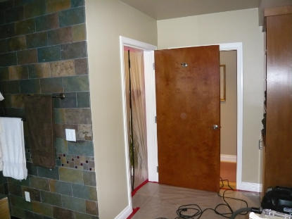 Toilet Leak: Bathroom plastic barriers to isolate mold damage during restoration